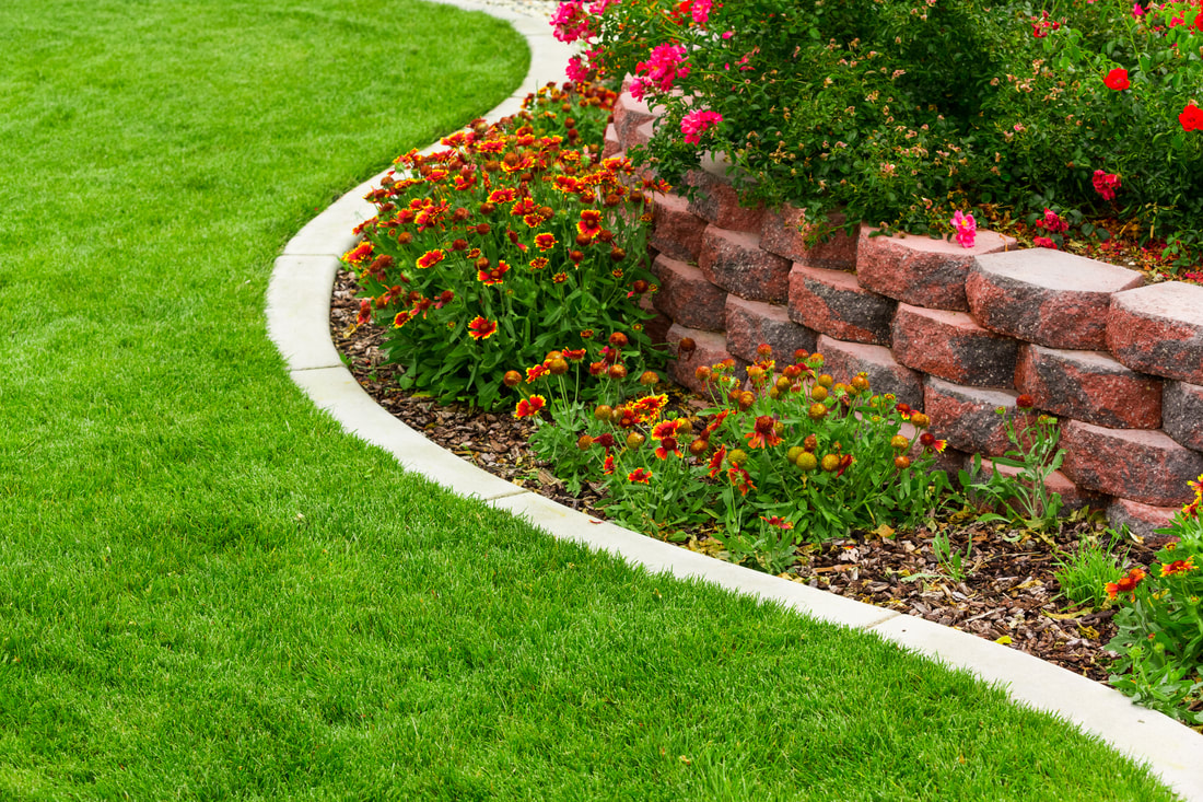 Augusta Lawn Care and Maintenance offer mulch services to help insure your flower beds stay healthy year-round.